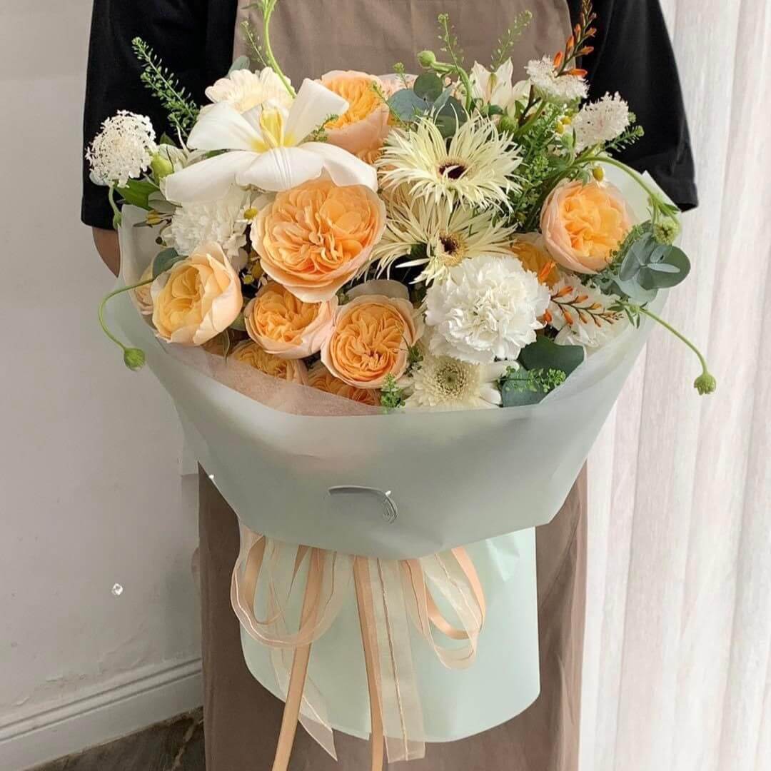 Hoa bó tone cam trắng