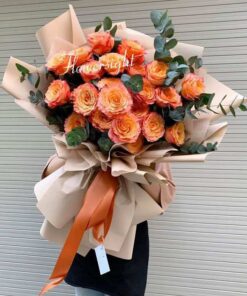 Told me - bó hoa hồng cam spirit được mua nhiều tại shop hoa FlowerSight