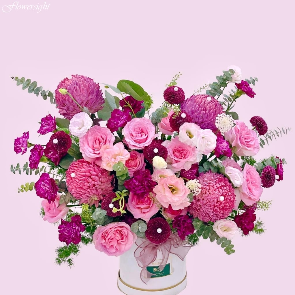 giỏ hoa khai trương màu hông ấm áp