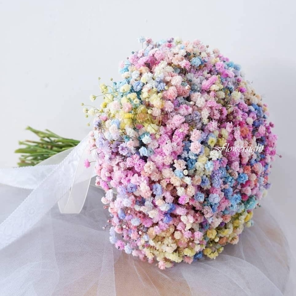 hoa cưới cầm tay cô dâu Tình Si