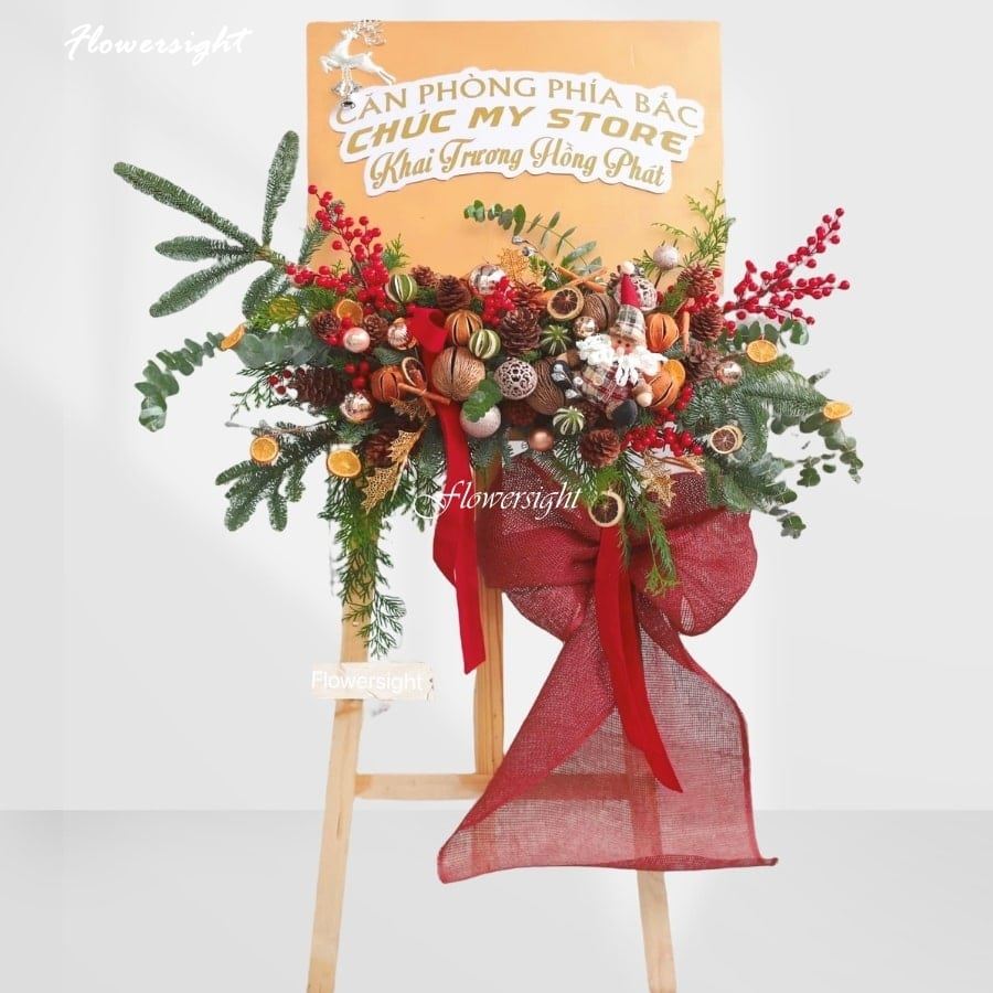 Kệ hoa chúc mừng thành lập công ty theo chủ đề Giáng sinh