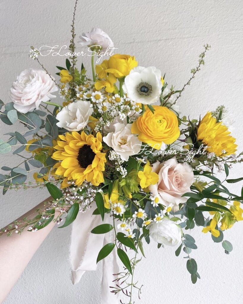 Bó hoa hướng dương đan xen cúc hoạ mi