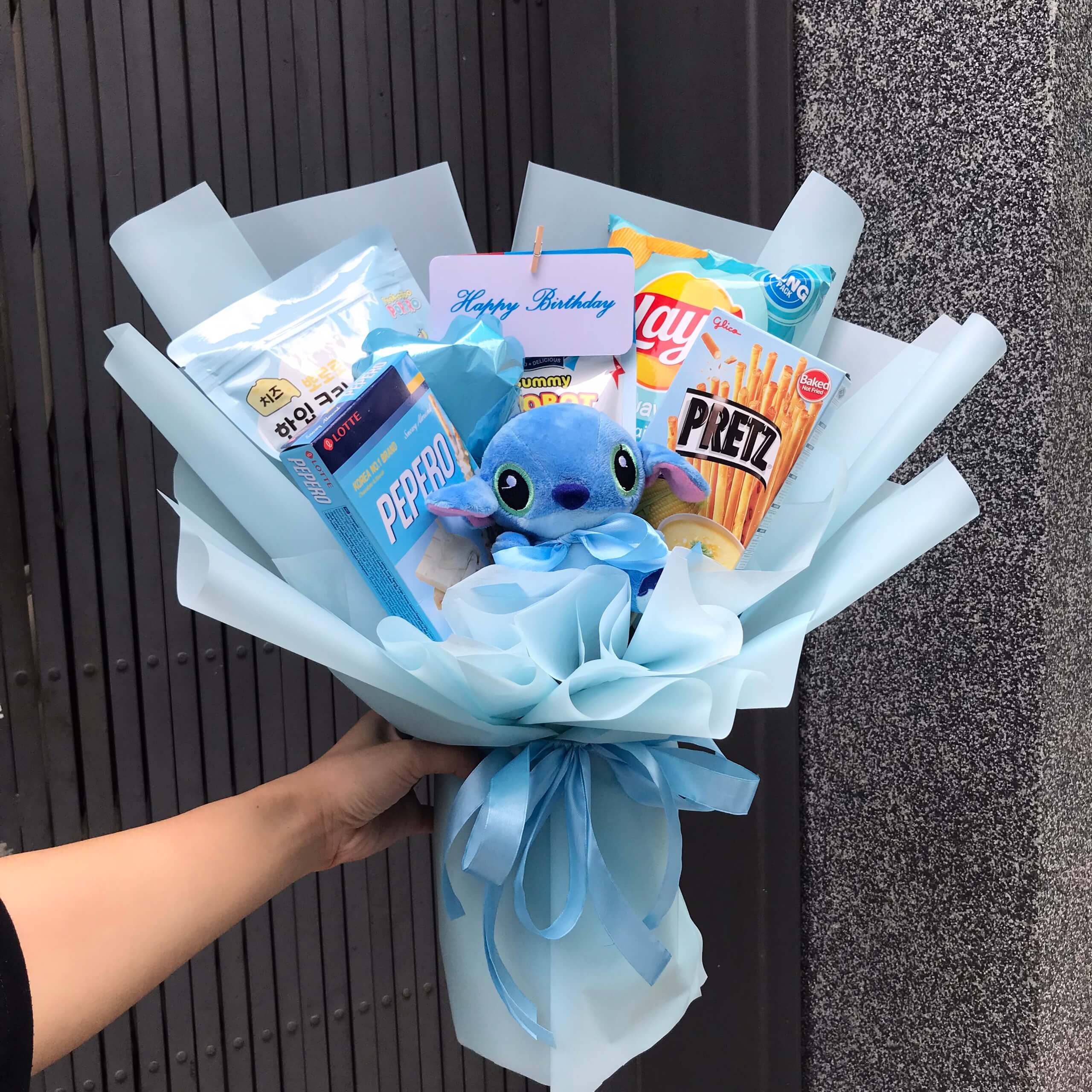 Bó hoa bánh kẹo màu xanh